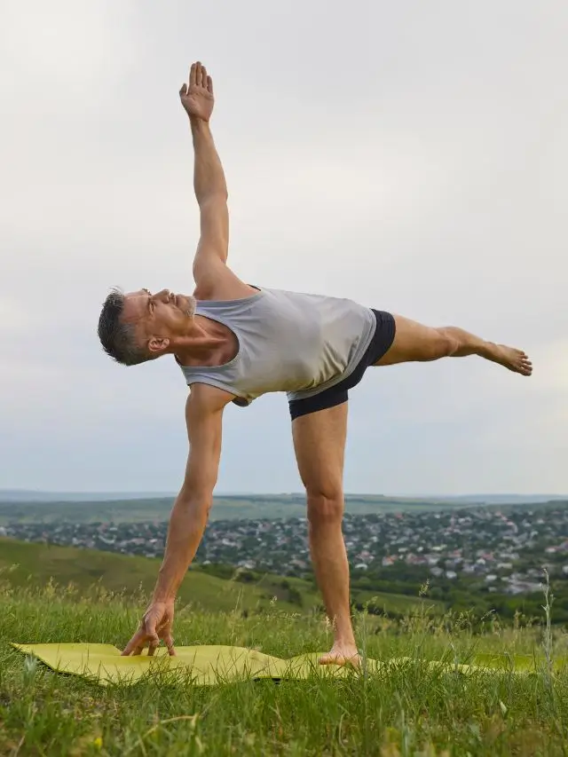 Easy Yoga Poses for Beginners: A Step-by-Step Guide 9 a-man-doing-half-moon-pose